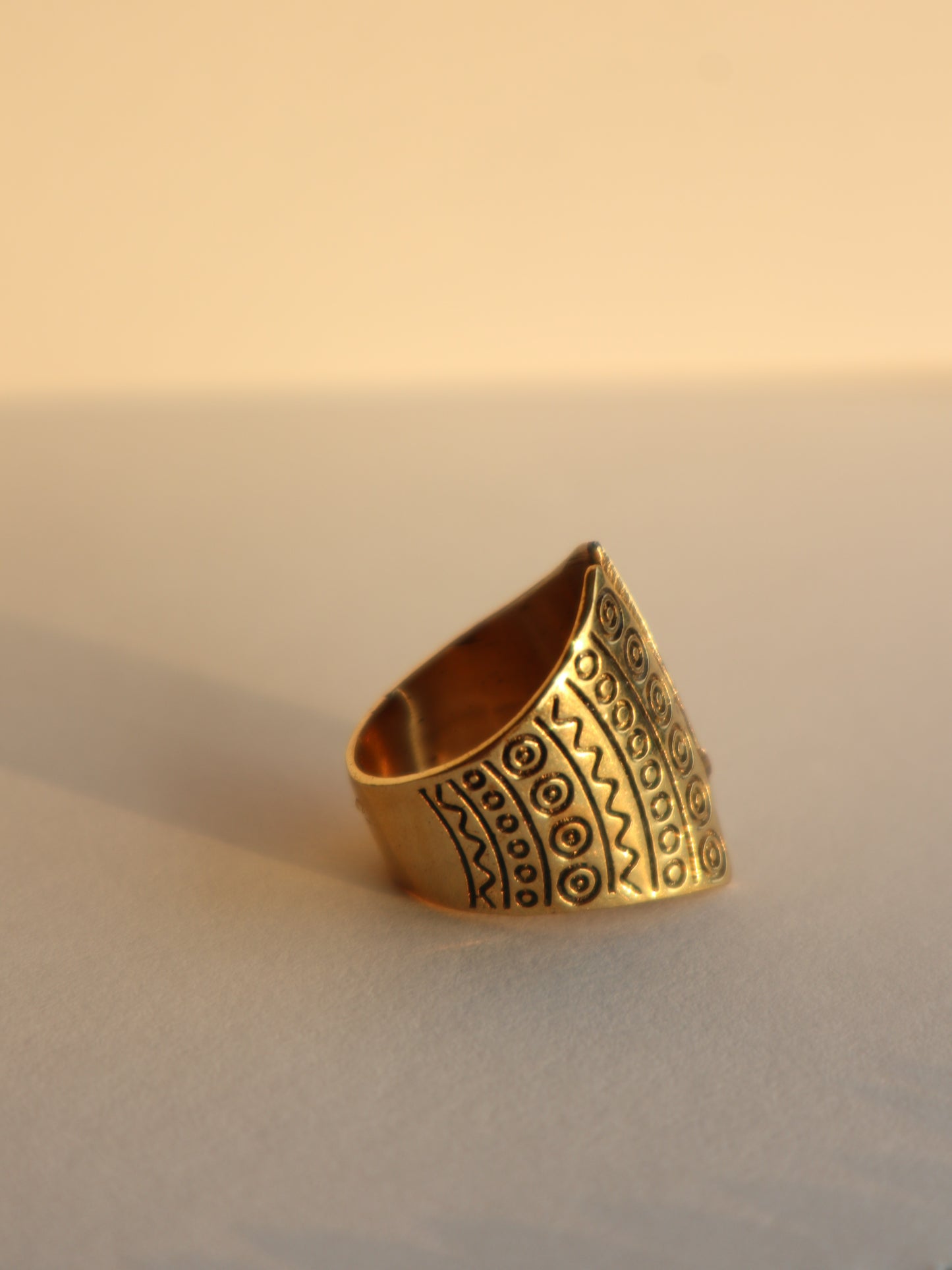 Totem brass ring