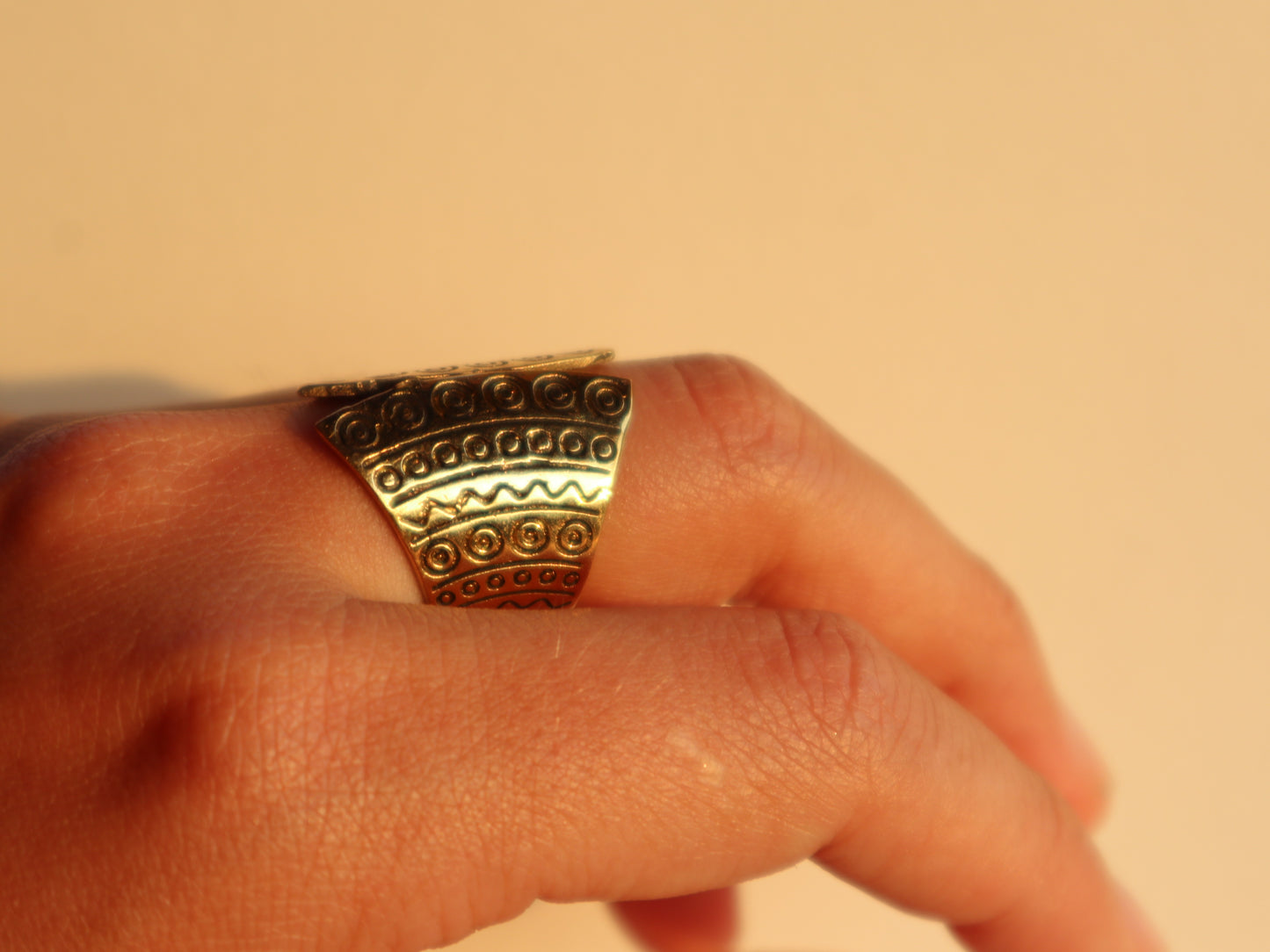 Totem brass ring