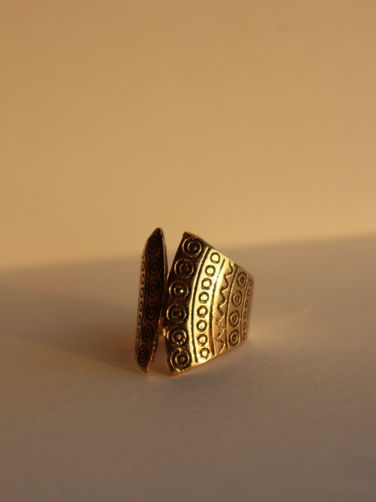 Totem brass ring